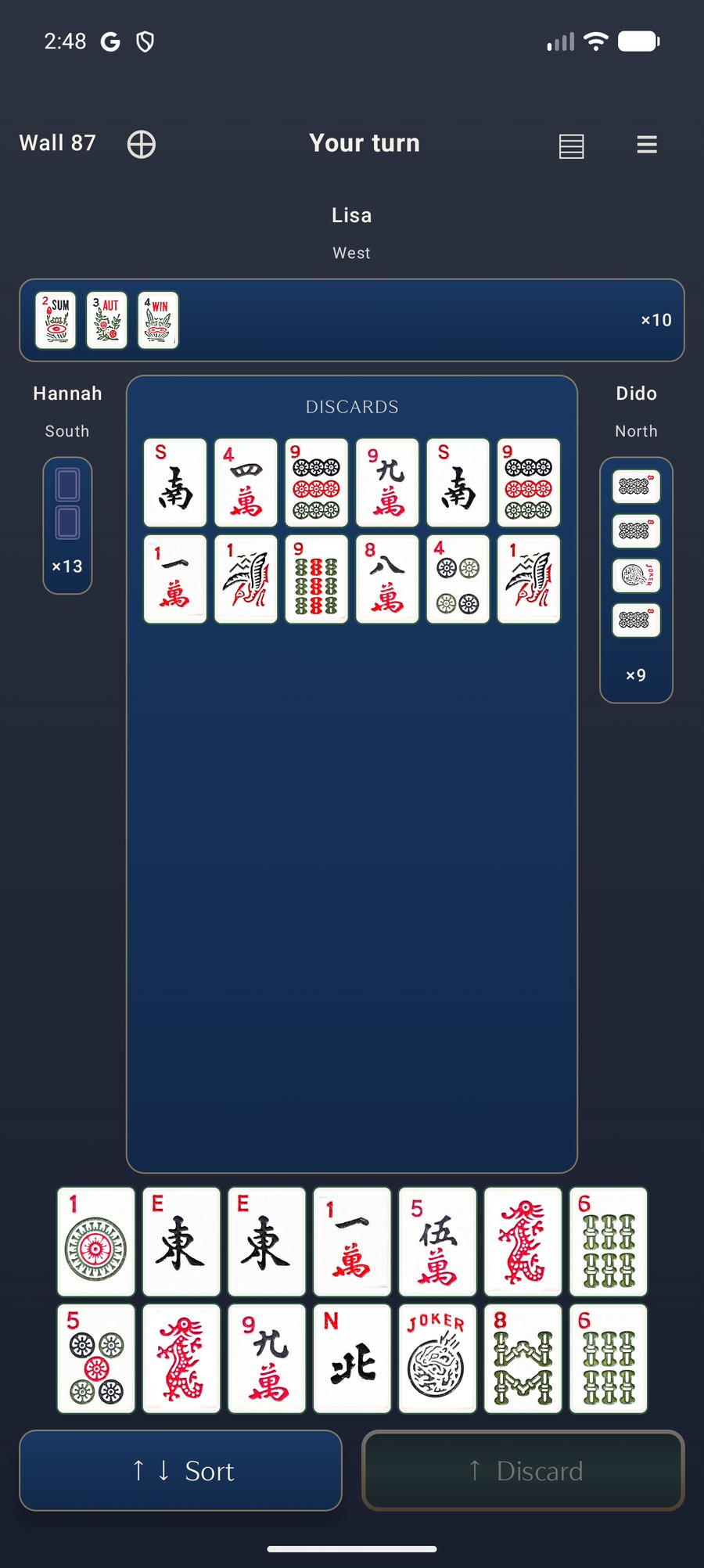 A mid-hand table on Android with the Original tile set, showing the discard floor and a full rack